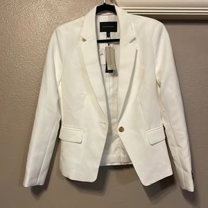 Excellent used condition - banana republic white blazer. No tags.